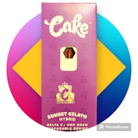 a box of cake e-liquid with a purple background