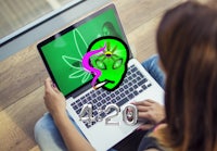 a woman using a laptop with the word 420 on it